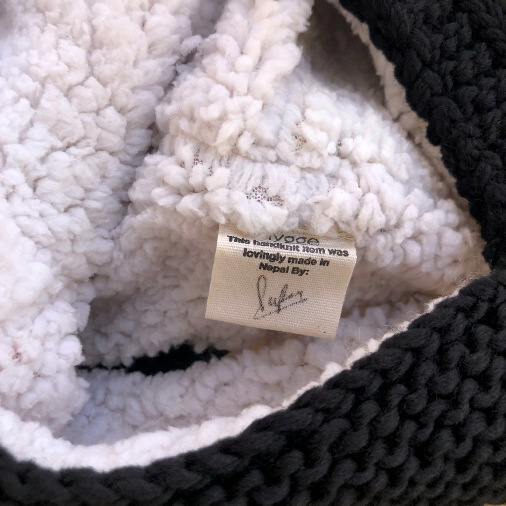 Black kitty hood interior label detail